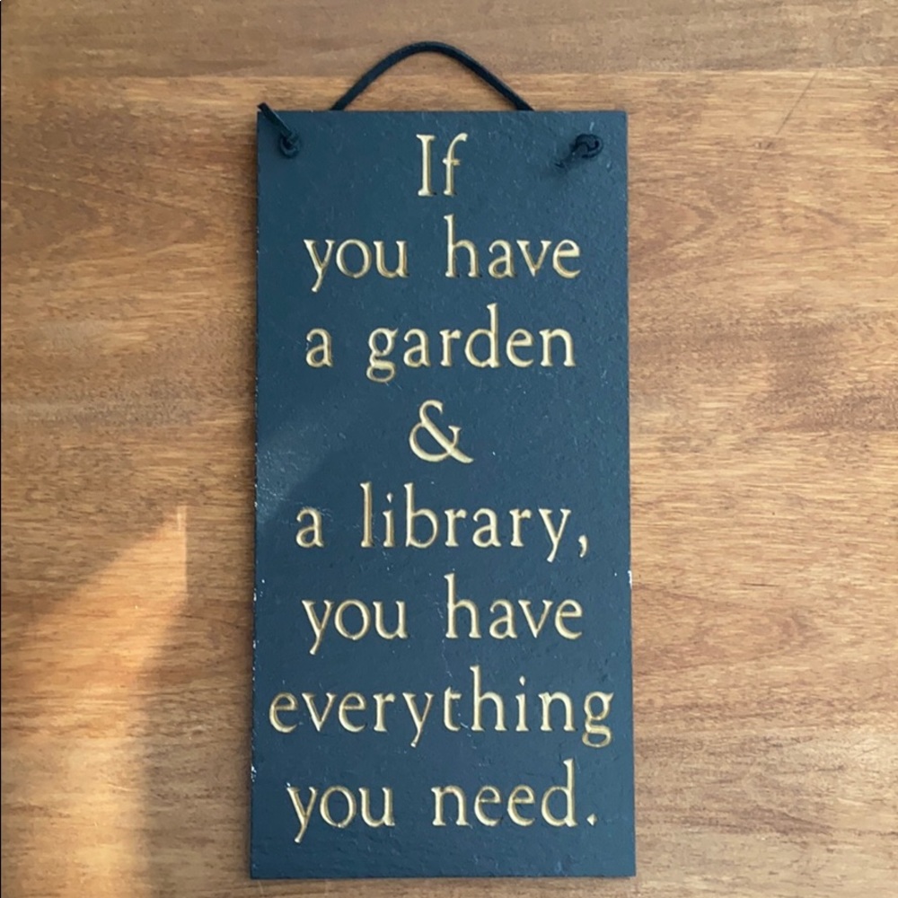 “If you have a garden & a library...” sign